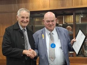 Dianella President Brian Niedziecki presents Bro Lou Daily with his 25 year certificate